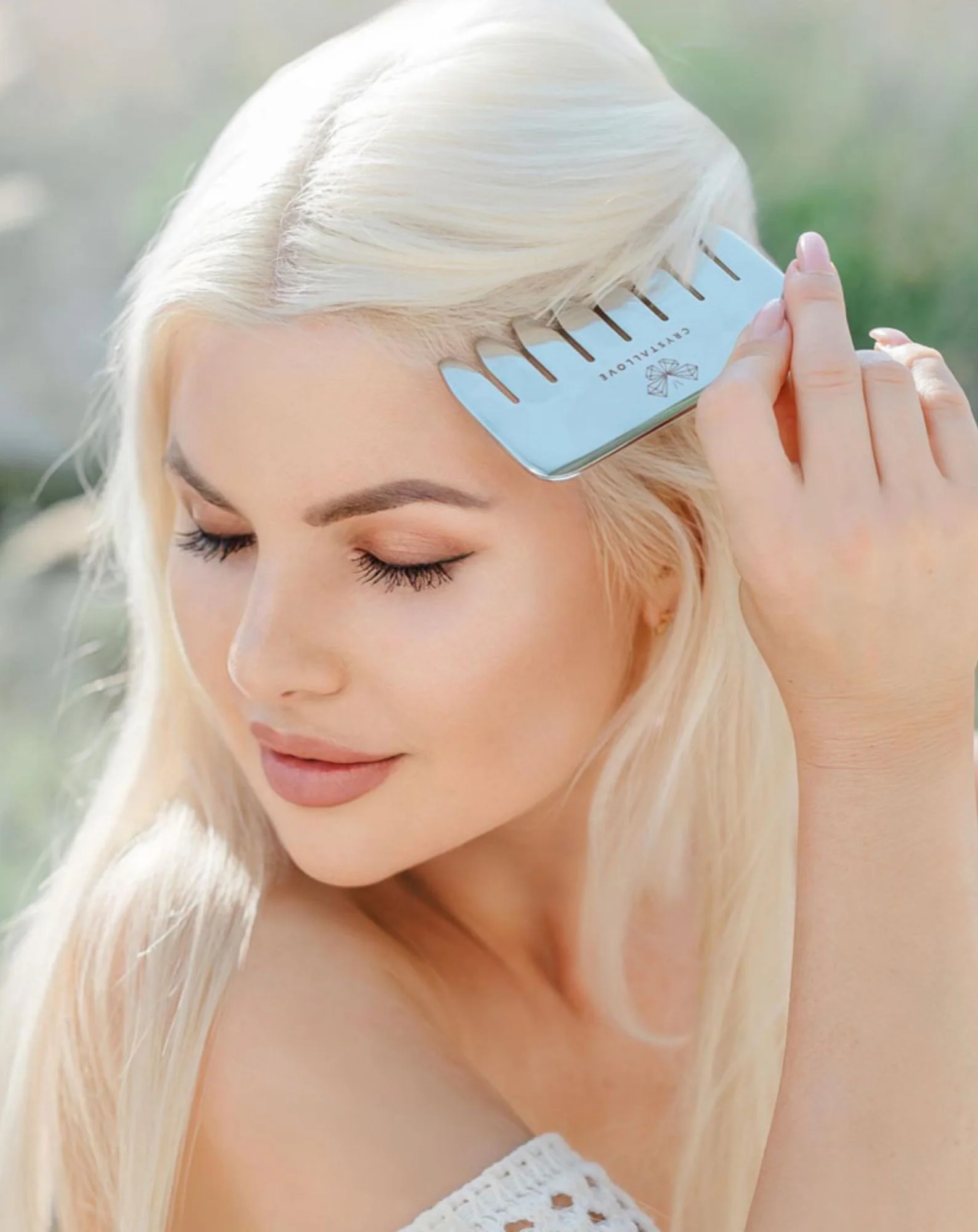 Grzebień do masażu skóry głowy i ciała ze stali nierdzewnej Cryo ice comb Crystallove - Image 2
