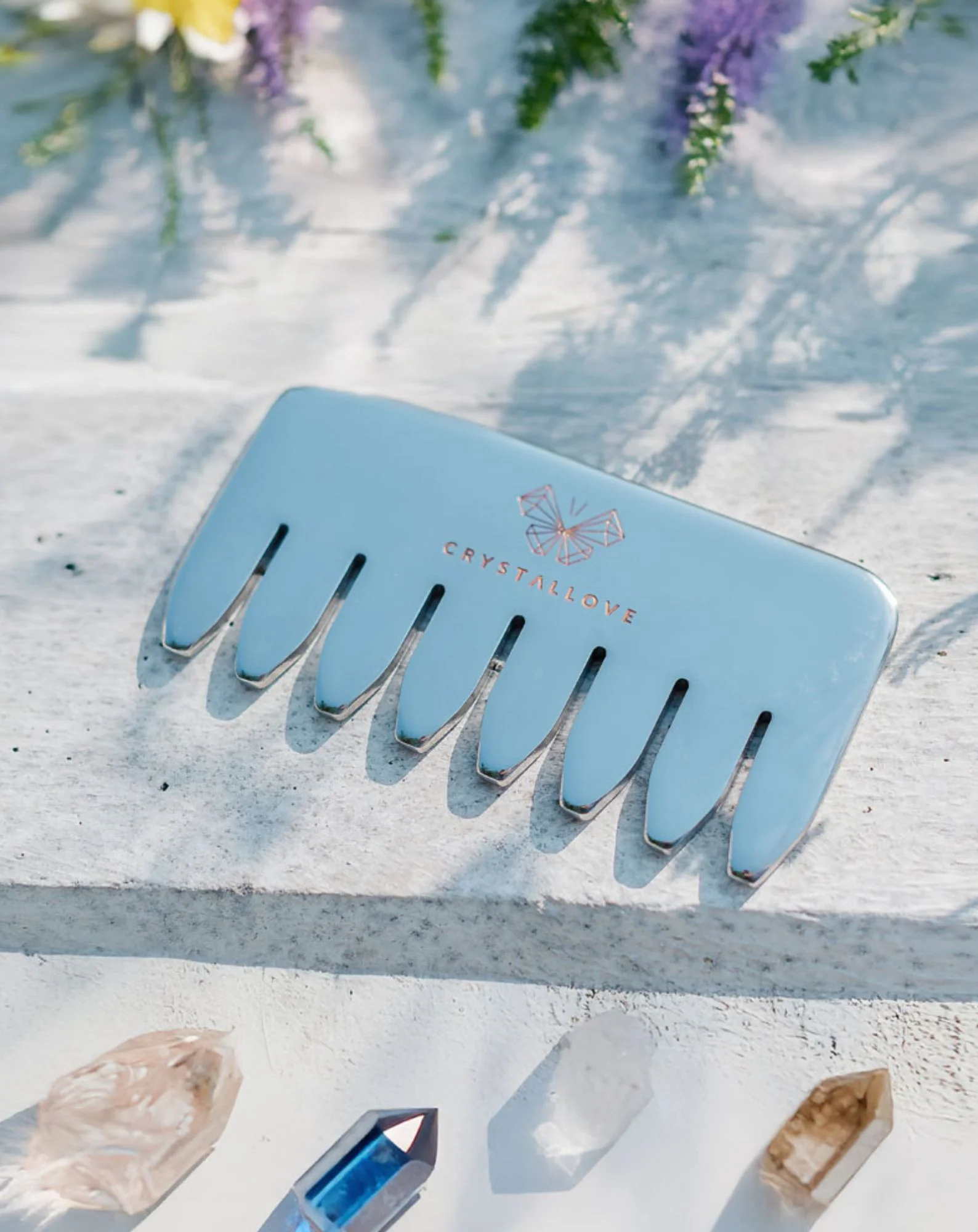 Grzebień do masażu skóry głowy i ciała ze stali nierdzewnej Cryo ice comb Crystallove - Image 4